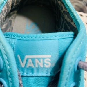 Vans Turquoise w/gray accents. Size 5 Women’s. Worn only once.